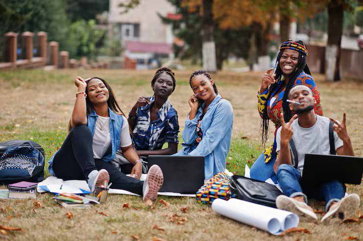 Students pictured together in the SMTI brand guide